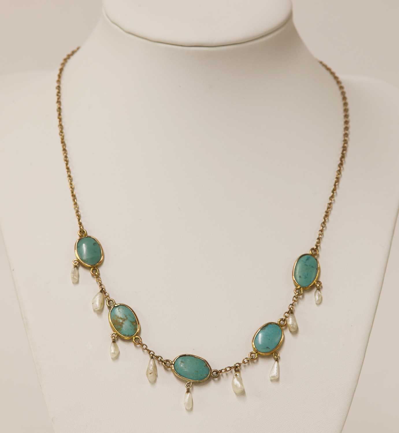Lot 64 - An Edwardian gold turquoise and dog tooth pearl fringe necklace