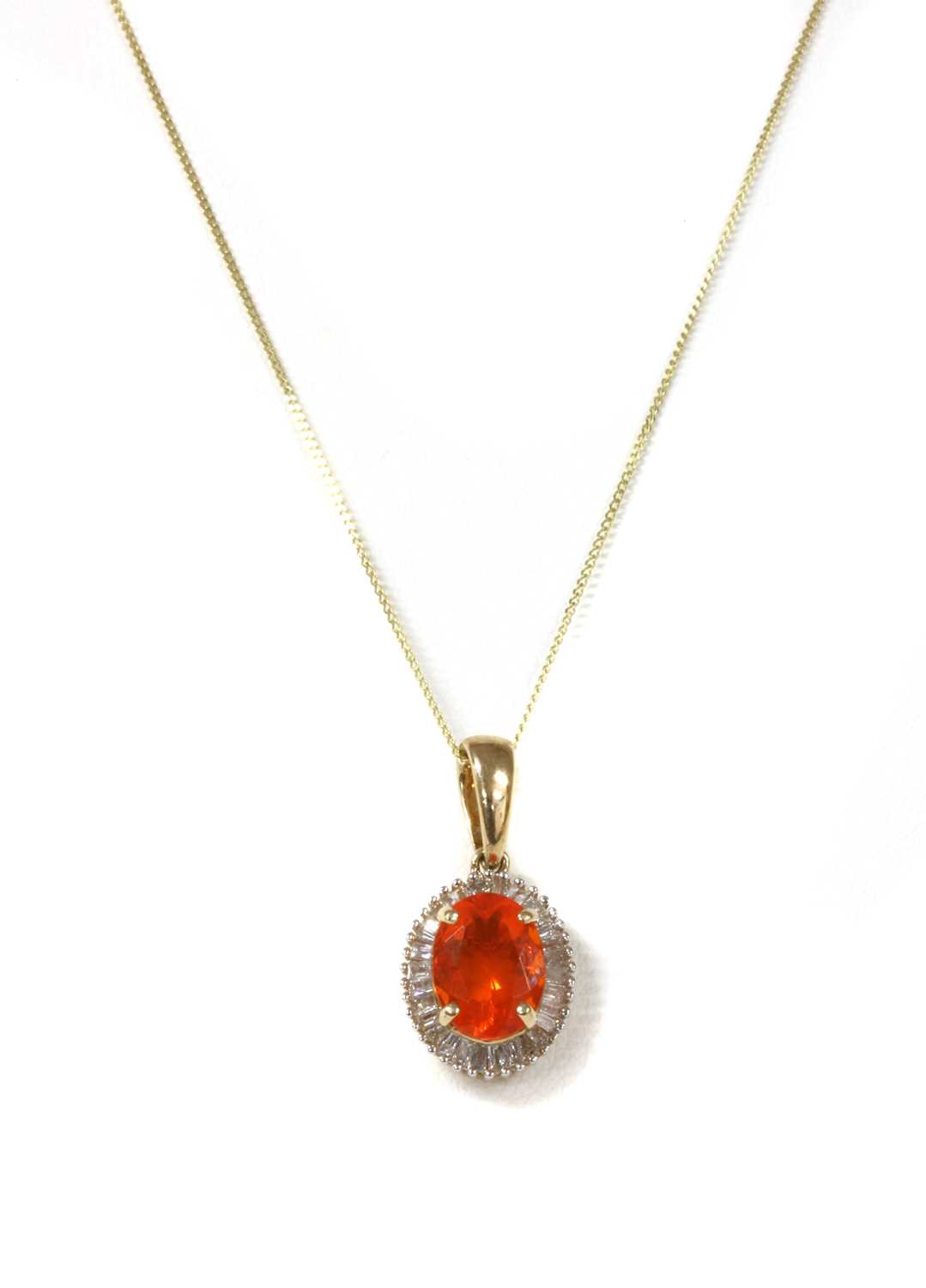Lot 1168 - A gold fire opal and diamond cluster pendant