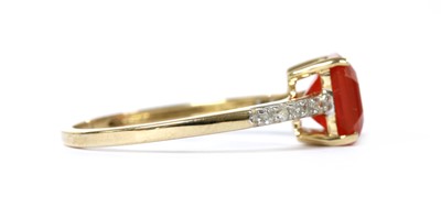 Lot 1175 - A gold fire opal and diamond ring