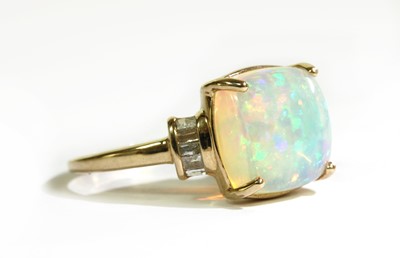 Lot 319 - A gold opal and diamond ring