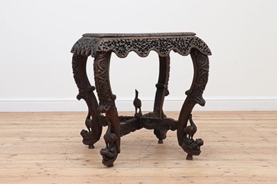 Lot 661 - A Burmese hardwood square table