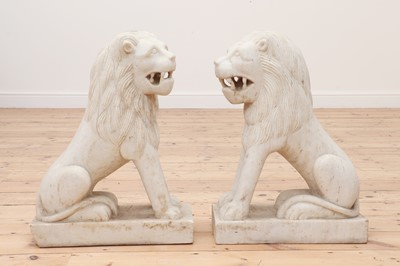 Lot 147 - A pair of marble seated lions