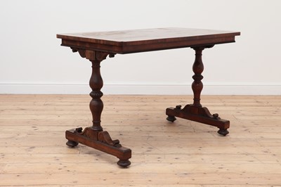 Lot 657 - A rosewood library table in the manner of Gillows