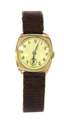 Lot 1313 - A 9ct gold mechanical strap watch
