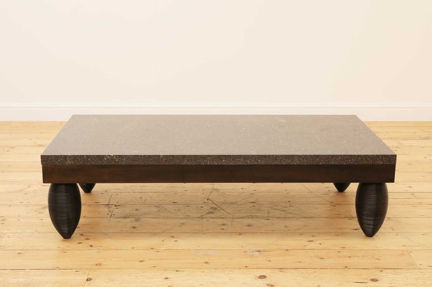 Lot 256 - A porphyry-topped rectangular low table