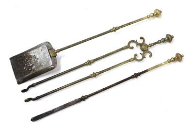 Lot 224 - A set of George III brass fire irons