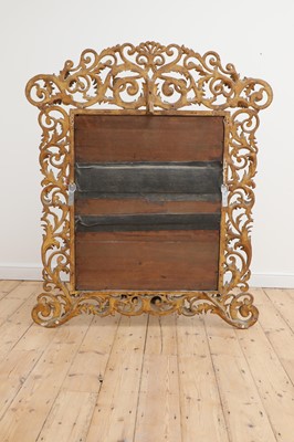 Lot 609 - A carved giltwood Florentine mirror