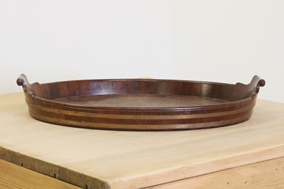 Lot 214 - A George III mahogany oval tray