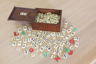 Lot 622 - A bone spelling set