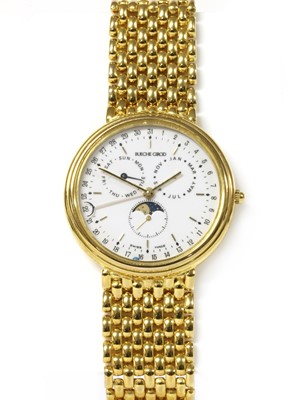 Lot 1302 - A gentlemen's 9ct gold Bueche Girod calendar moonphase quartz bracelet watch