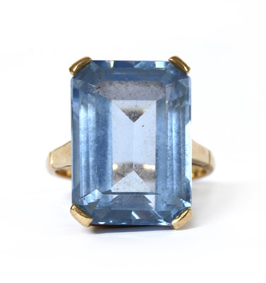 Lot 1232 - A gold single stone synthetic spinel ring