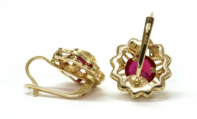 Lot 1150 - A pair of 14ct gold synthetic ruby asymmetric earrings