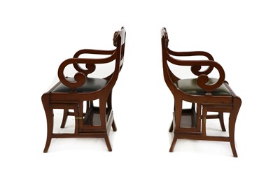 Lot 452 - A pair of George IV style mahogany and walnut metamorphic library chairs