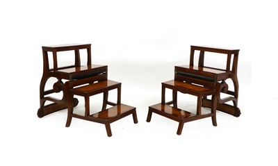 Lot 452 - A pair of George IV style mahogany and walnut metamorphic library chairs