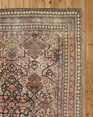 Lot 128 - A Kirman wool carpet