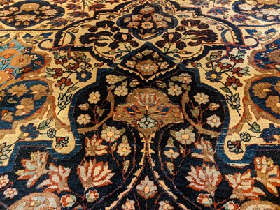 Lot 128 - A Kirman wool carpet