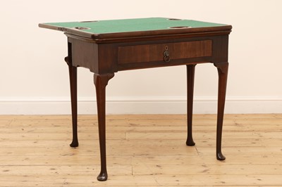 Lot 332 - A George III mahogany triple fold-over games and tea table