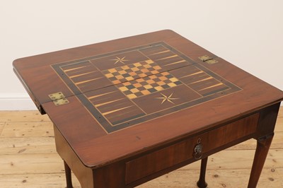 Lot 332 - A George III mahogany triple fold-over games and tea table