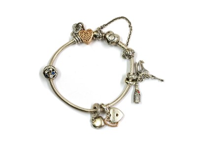 Lot 1274 - A silver Pandora charm bracelet