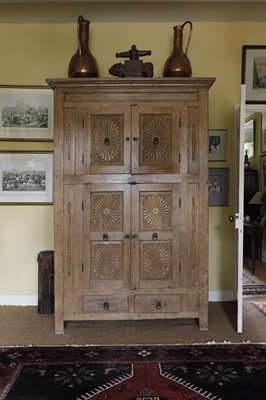 Lot 720 - An Indian teak cupboard