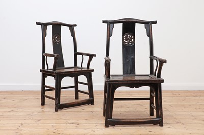 Lot 197 - A pair of ebonised elm yoke-back armchairs