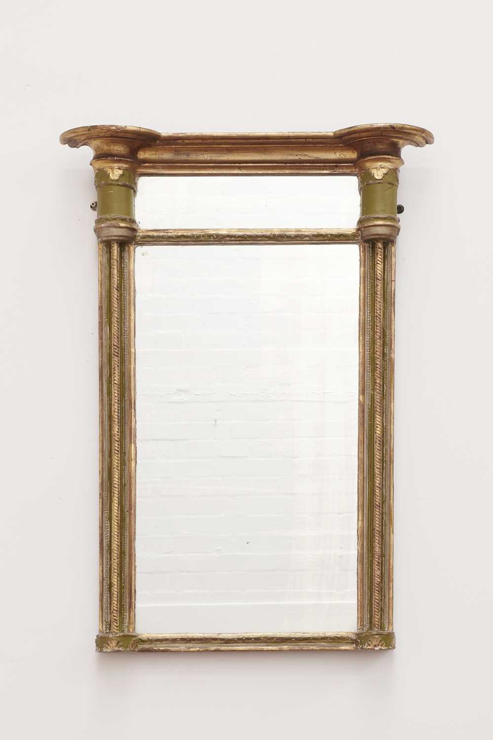 Lot 655 - A George III gilt and later painted pier mirror