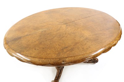 Lot 552 - A Victorian walnut centre table
