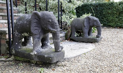 Lot 807 - A pair of carved lava stone elephants