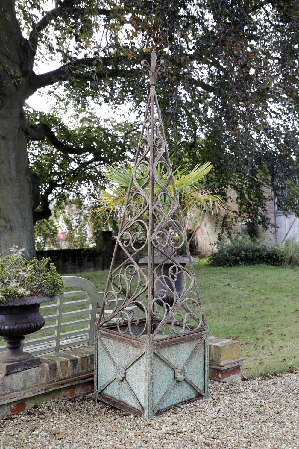 Lot 812 - A pair of iron obelisks