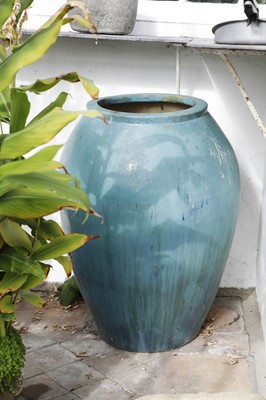 Lot 820 - A pair of large turquoise-glazed terracotta jars