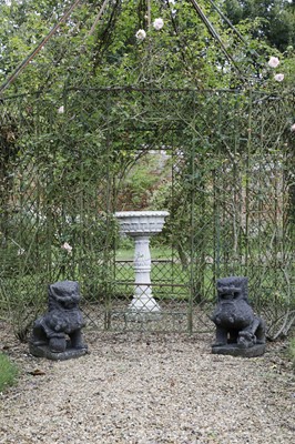 Lot 832 - A carved marble pedestal font
