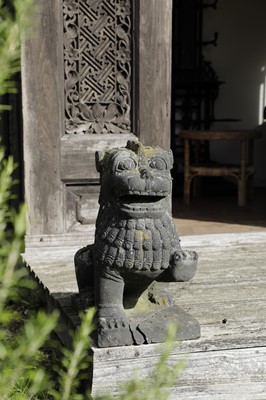 Lot 833 - A pair of carved lava stone Dogs of Fo