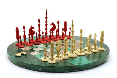 Lot 96 - A stained bone chess set