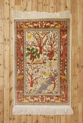 Lot 14 - A silk rug