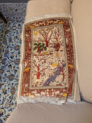 Lot 14 - A silk rug