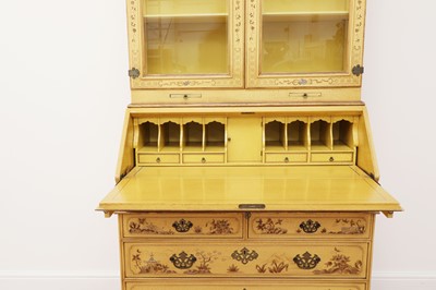 Lot 109 - A George II-style yellow-lacquered bureau bookcase
