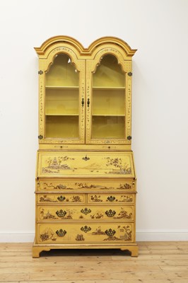 Lot 109 - A George II-style yellow-lacquered bureau bookcase