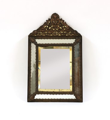 Lot 467 - A small Dutch repousse mirror