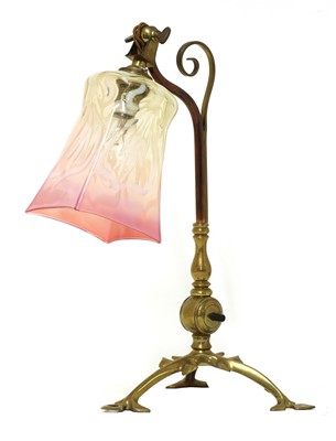 Lot 140 - An Arts and Crafts copper and brass table lamp