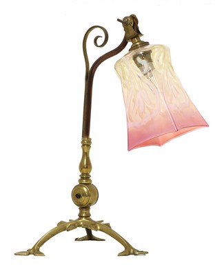 Lot 140 - An Arts and Crafts copper and brass table lamp