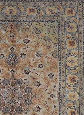 Lot 106 - A Persian silk rug