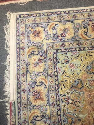 Lot 106 - A Persian silk rug