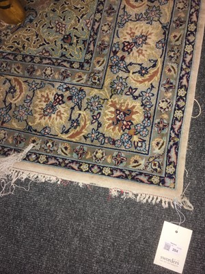 Lot 106 - A Persian silk rug