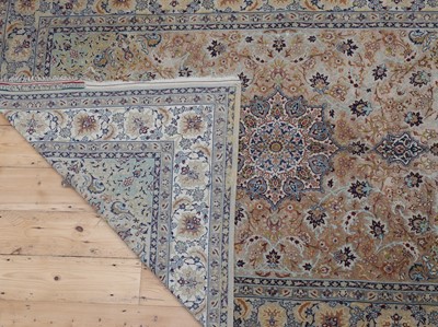 Lot 106 - A Persian silk rug