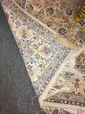 Lot 106 - A Persian silk rug