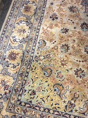 Lot 106 - A Persian silk rug