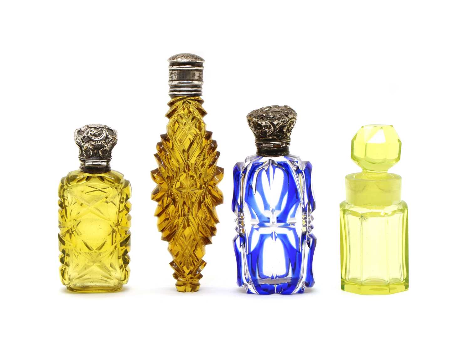 Lot 61 - A collection of four Bohemian glass scent bottles
