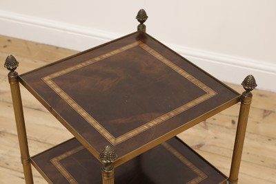 Lot 246 - A three-tier étagère occasional table