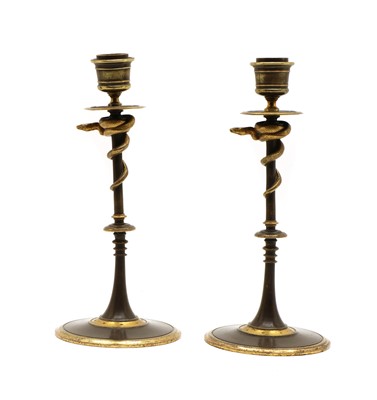 Lot 219 - A pair of serpent candle sticks by Ferdinand Barbedienne