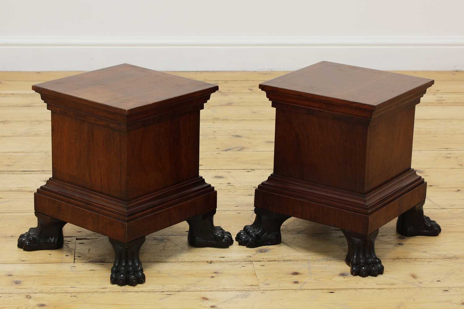 Lot 36 - A pair of mahogany stands